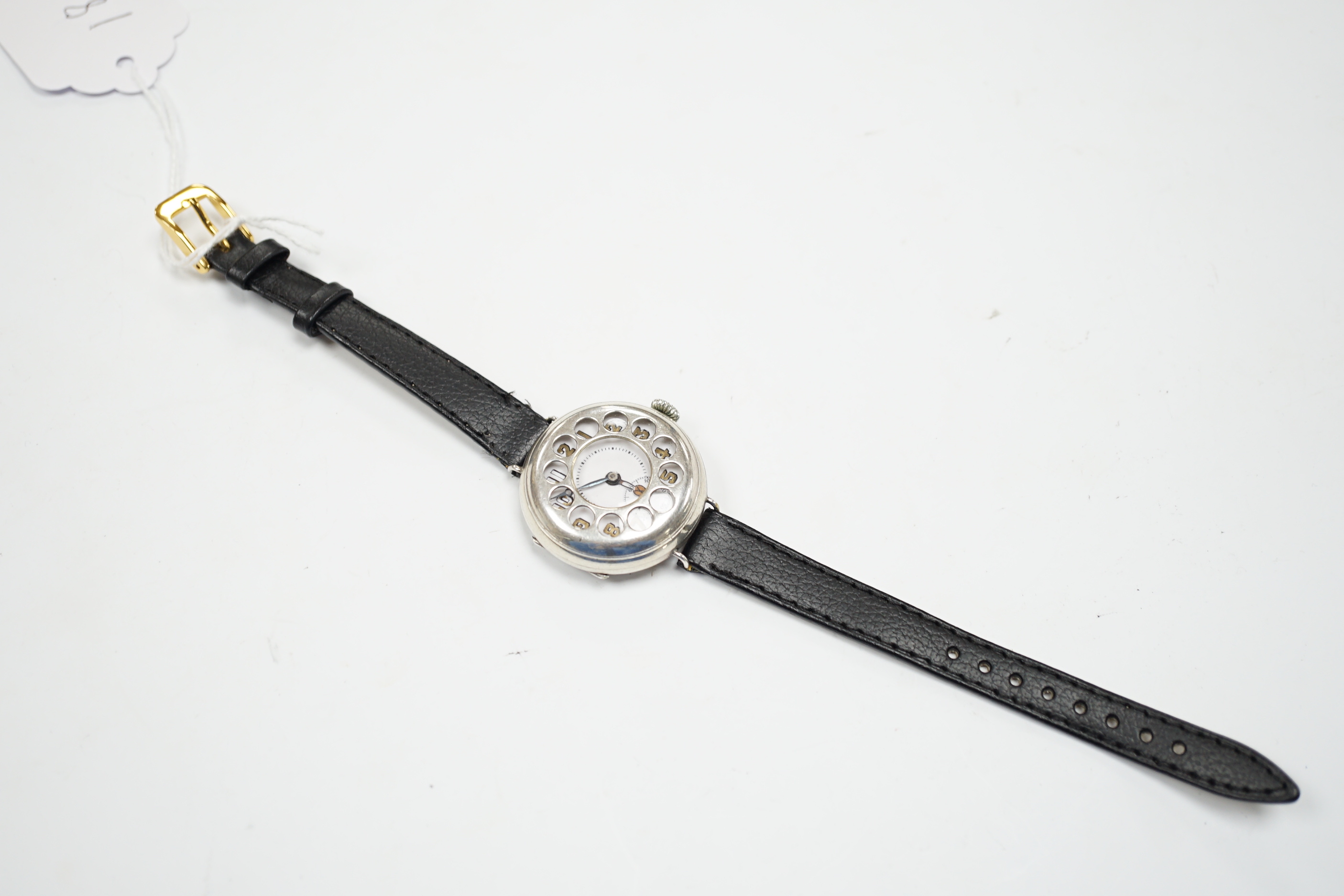 A gentleman's continental 800 standard white metal manual wind WW1 trench wrist watch, with 'telephone dial' cover, on later associated strap.